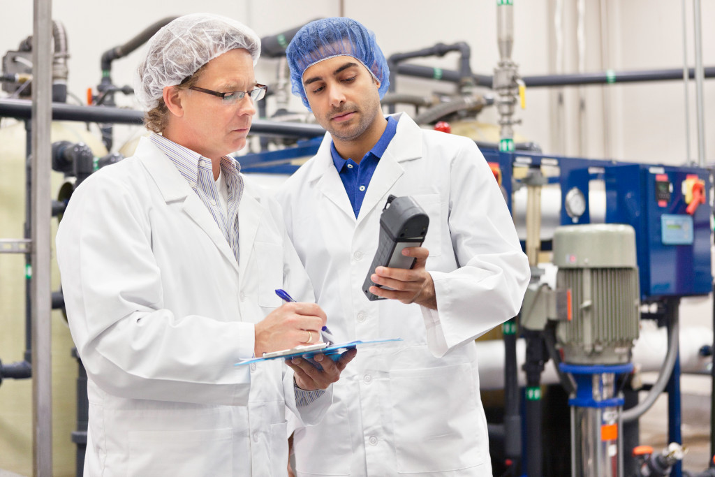 Two men working in bottling factory Importance of online inductions for OHS training
Every employer and business is legally responsible for ensuring the health and safety of their employees. Diligent and thorough OHS (Occupational Health & Safety) compliance is what establishes a regulated and safe workplace for the employees and visitors of a site or place of…