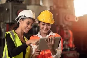 two workers are happy after completing their work induction