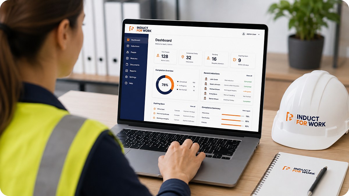 Induct For Work dashboard displayed on a laptop during workplace induction administration